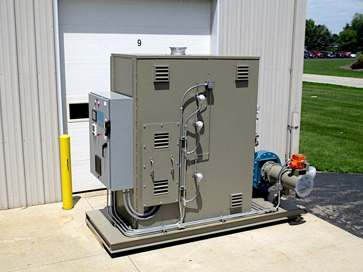 A green Electric Catalytic Oxidizer on skid waits to be installed inside a metal finishing facility. The ECO’s Small Footprint allows interior, elevated or rooftop installation for Abatement of VOC such as Heptane.