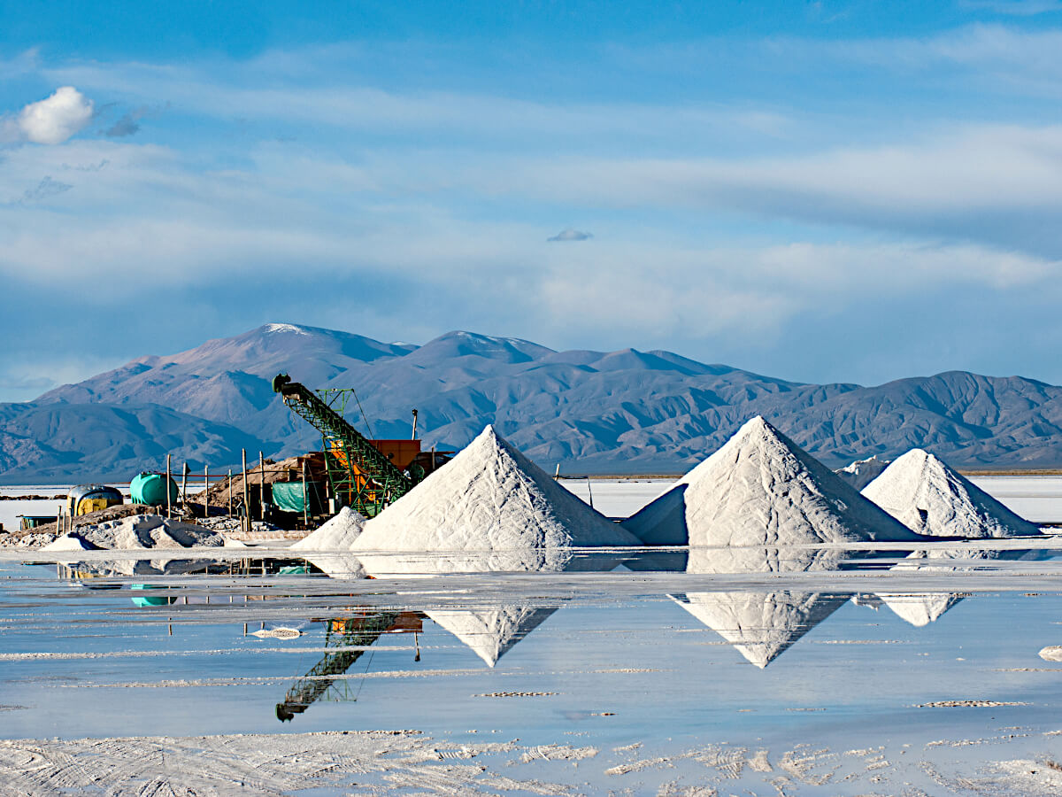 Piles of Lithium Salts Are Collected From Salt Water Ponds With Mining Equipment