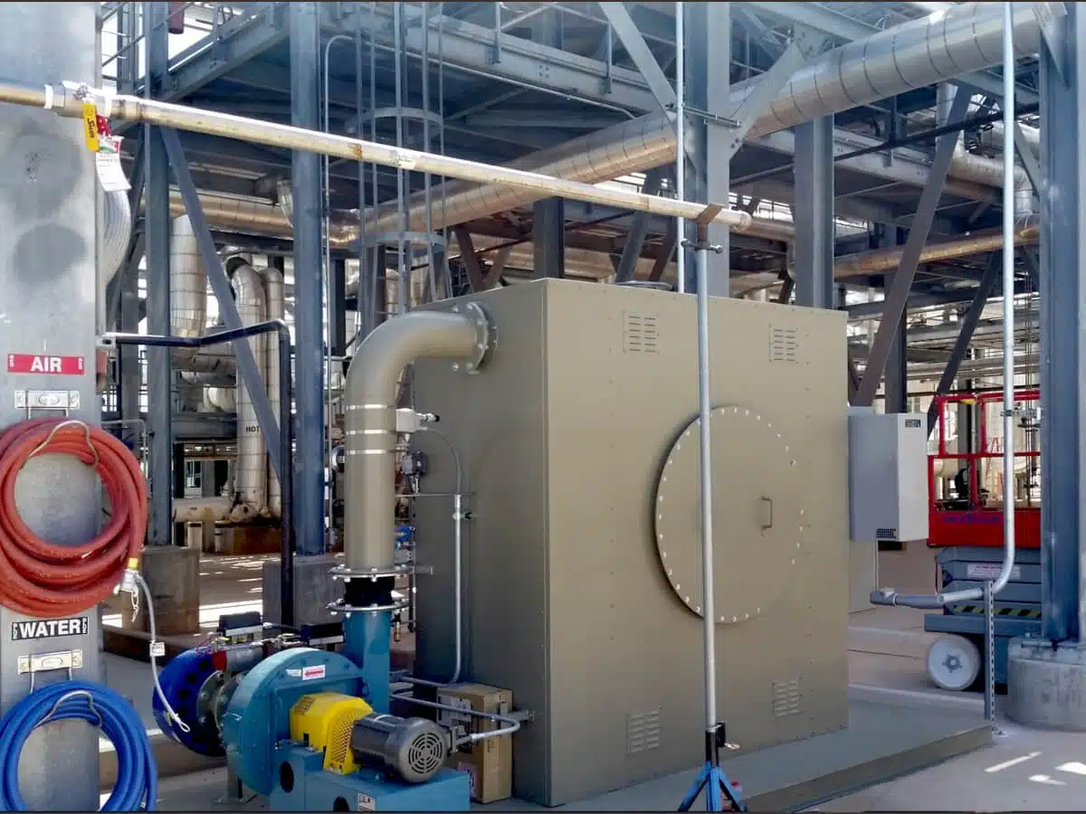 Pollution Systems OEM Electric Recuperative Catalytic Oxidizer (ERCO) for sustainable VOC abatement at a solar power facility. Green air pollution control equipment for industrial carbon footprint reduction.