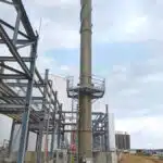 Pollution Systems OEM Vertical Enclosed Flare (CEF) with integrated emission testing platform for VOC abatement at a liquid tank storage terminal in Texas.