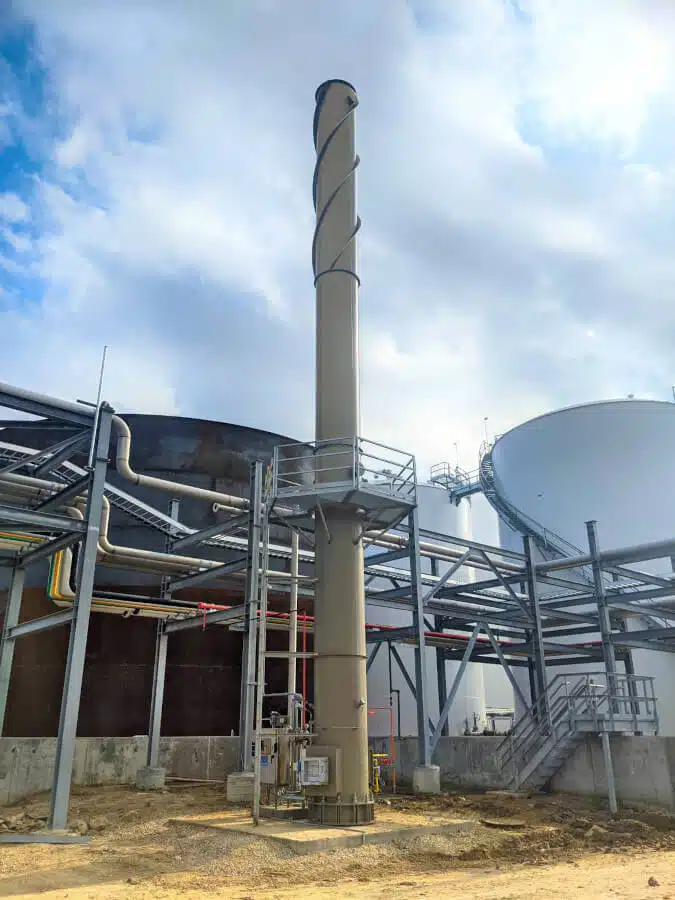 Pollution Systems OEM Vertical Vapor Combustor (Enclosed Flare) with integrated emission testing platform for NESHAP regulatory compliance.